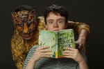 photo - Luc Roderique as Shere Khan and Camille Legg as Mowgli in Carousel Theatre for Young People’s The Jungle Book