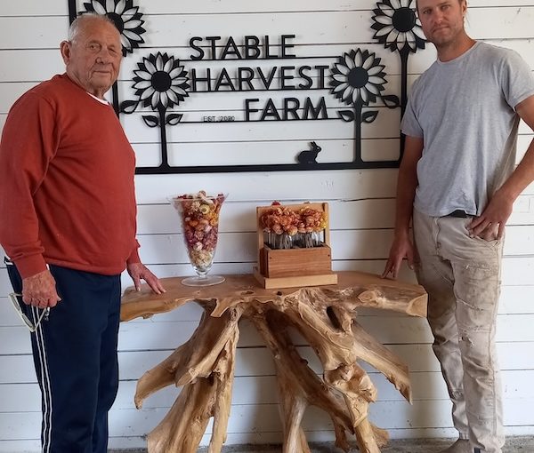 photo - Syd Belzberg, left, owner of Stable Harvest Farm in Langley, and farm manager Kristjan Johannson