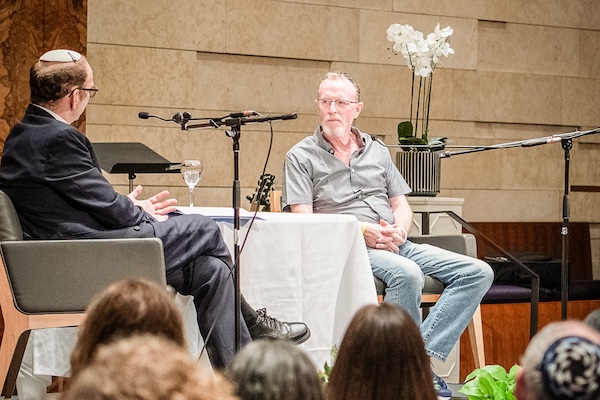 photo - Rabbi Jonathan Infeld, left, in conversation with Thomas Hand at Congregation Beth Israel