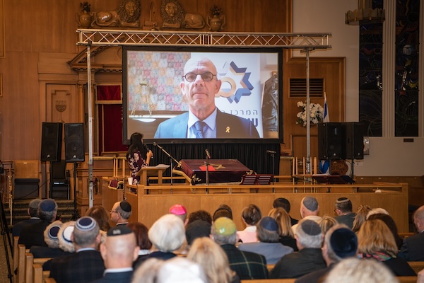 photo - Dr. Ofer Merin, director general of Shaare Zedek Hospital, spoke at the event via video. He was expected to be in Vancouver in person but stayed in Jerusalem due to intelligence that Iran might strike Israel during the time he was scheduled to be away