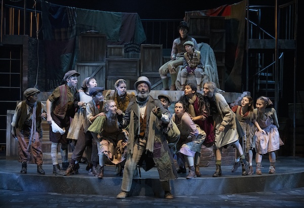 photo - Anthony Santiago, at front, plays Fagin in Gateway Theatre’s production of Oliver!, which runs until Jan. 4