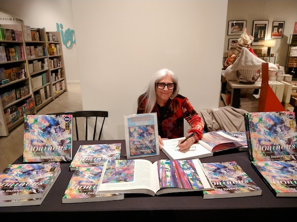 photo - Linda Dayan Frimer signs books at the Indigo in Victoria’s Mayfair Mall