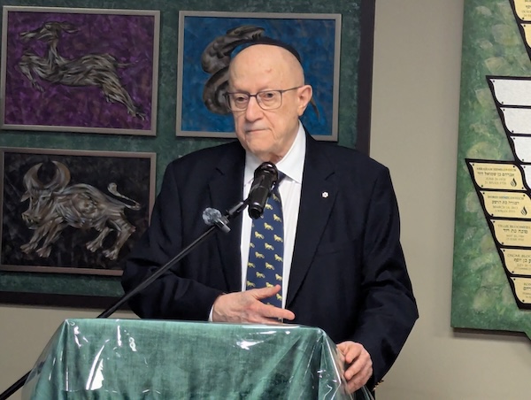 photo - Dr. Peter Suedfeld speaks at the International Holocaust Remembrance Day commemoration at the Bayit